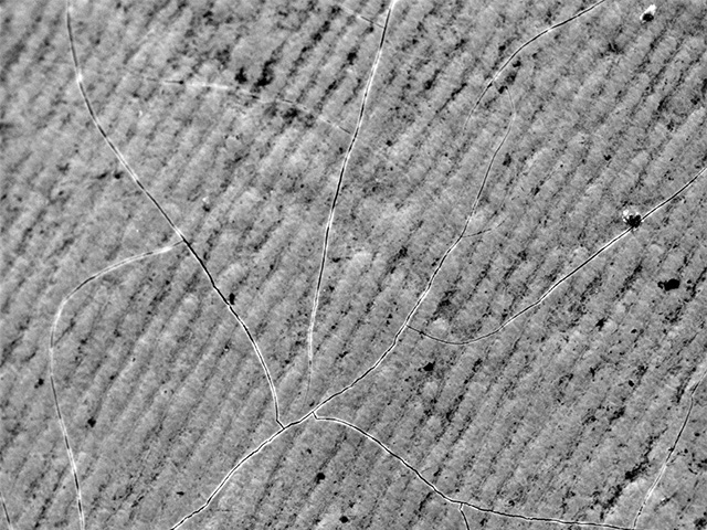 Armoloy Electrolizing microcracked thin dense chrome on surface at 500 magnification