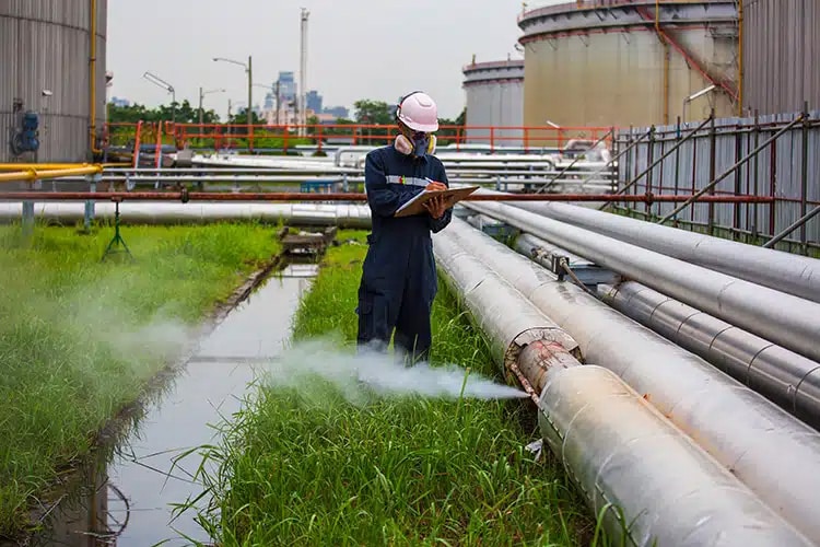 worker testing chromium coating quality