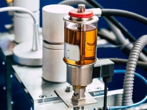 industrial oil lubricant housed in an automated lubrication canister